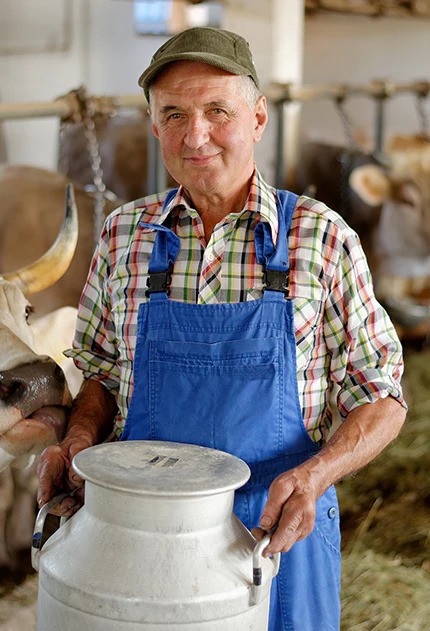 Person holding milk jug